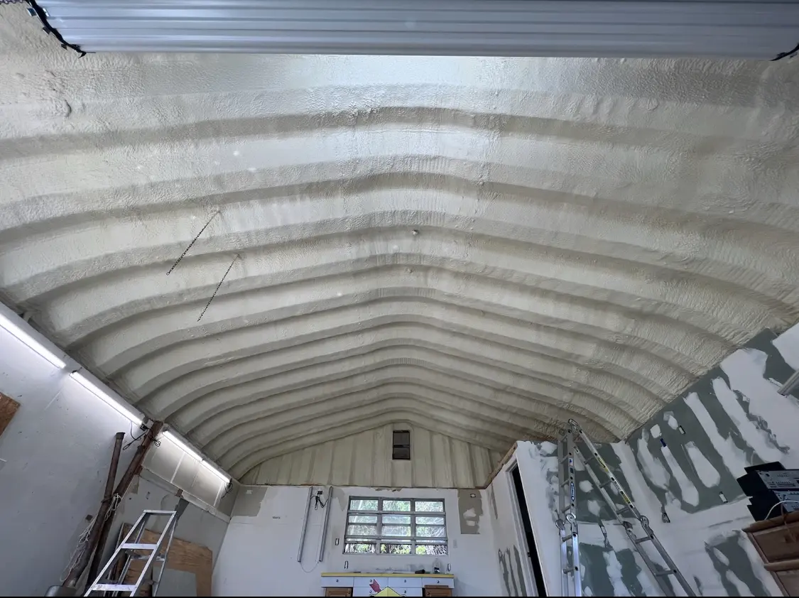 Spray polyurethane foam applied to the underside of a metal roof deck in Morris Plains